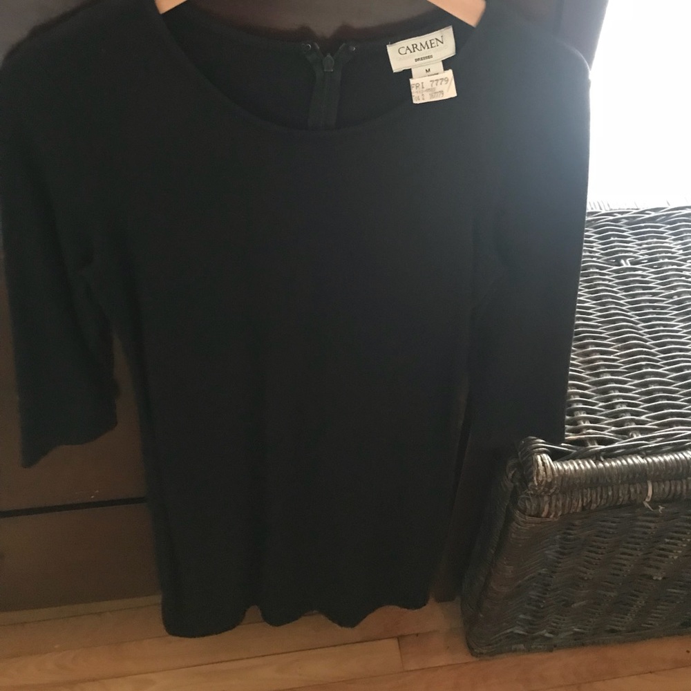 Black form fitting Carmen Marc Valvo dress